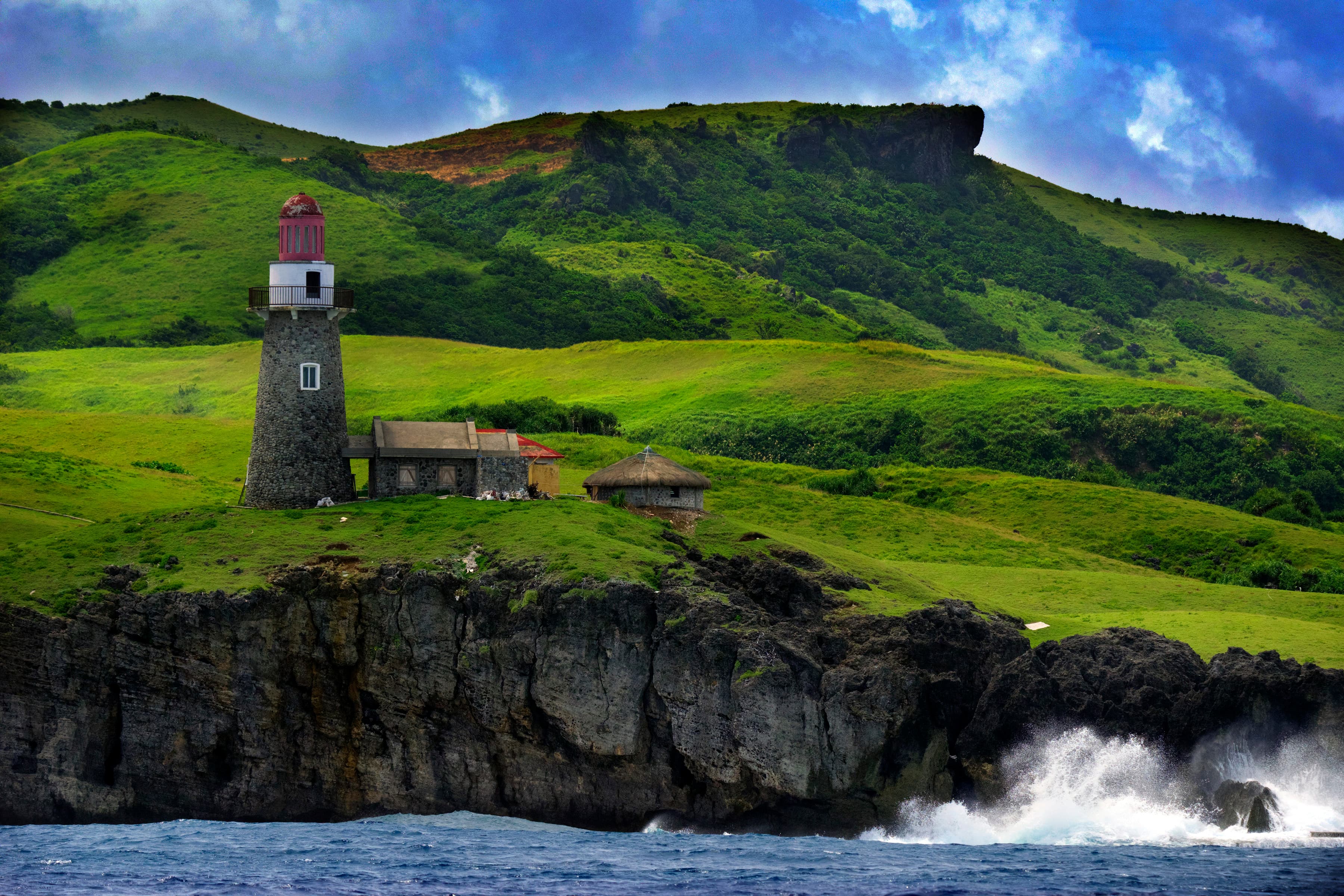 Rolling green hills and stone houses of Sabtang Island, Batanes