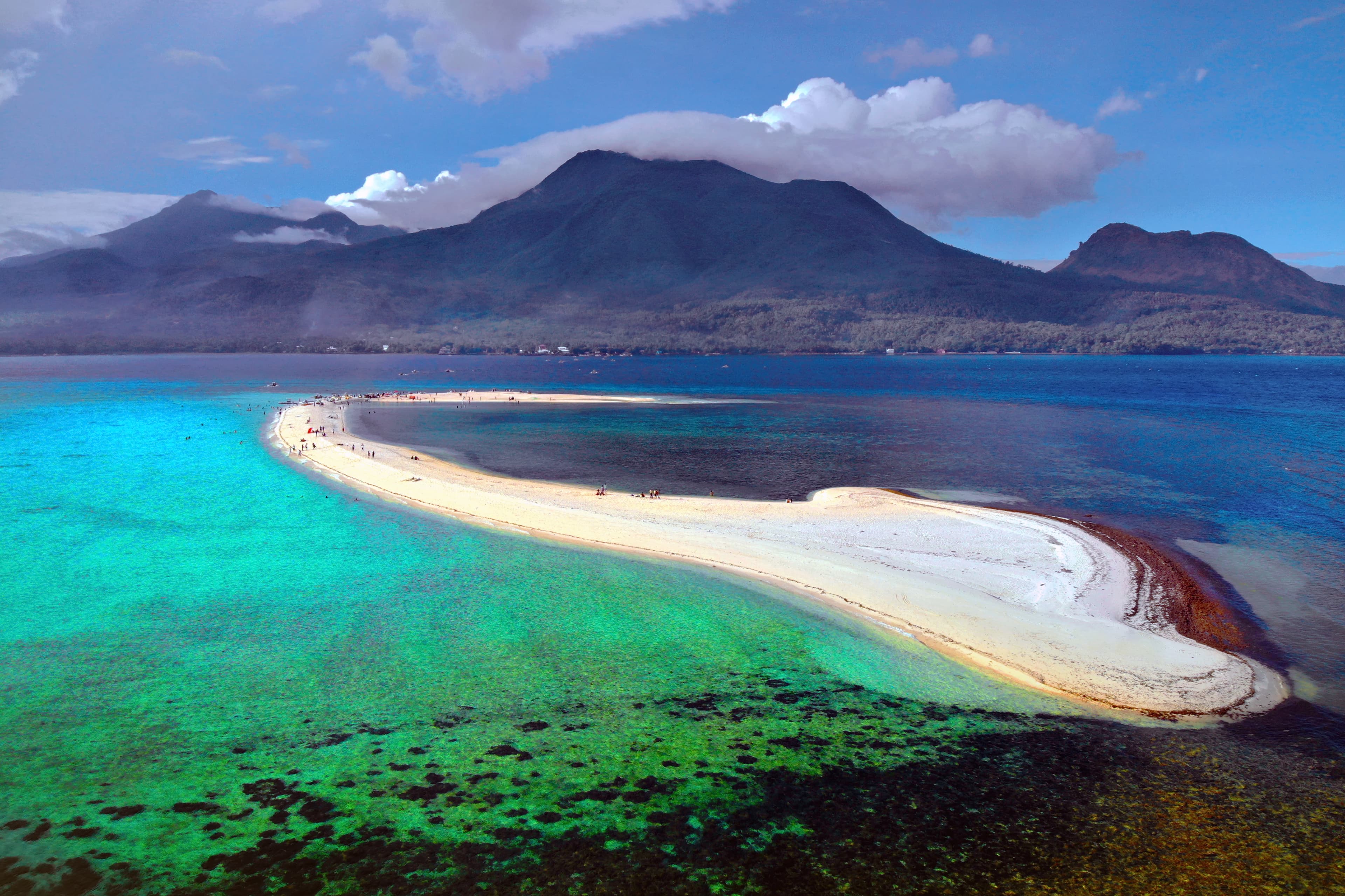 Mt. Hibok-Hibok and Timpoong peaks rising over Camiguin